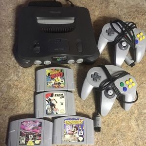 Nintendo 64 system 2 controllers 4 games N64